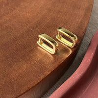 Brinco Articulado em U Dourado