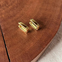 Brinco Articulado em U Dourado